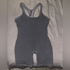 SKIMS Outdoor Mid Thigh Bodysuit in a color Charcoal